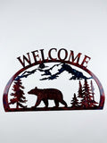 Bear Heading Left With Trees and Blue Mountains 1/2 Oval Welcome Metal Sign